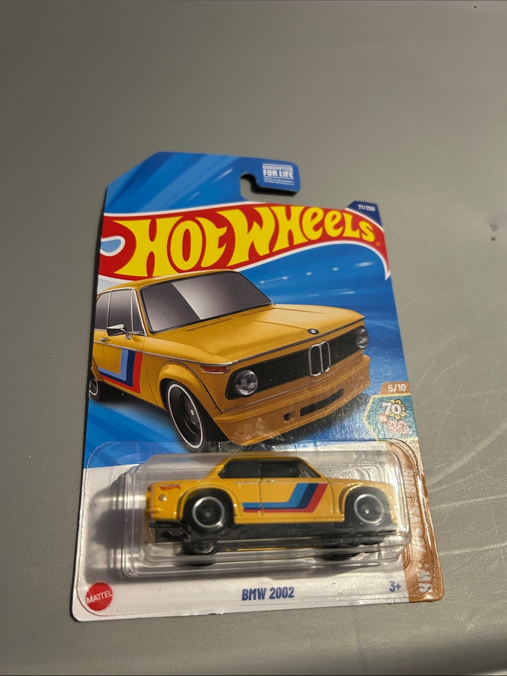 Mattel Hot Wheels Yellow BMW 2002 with Red & Blue Stripes